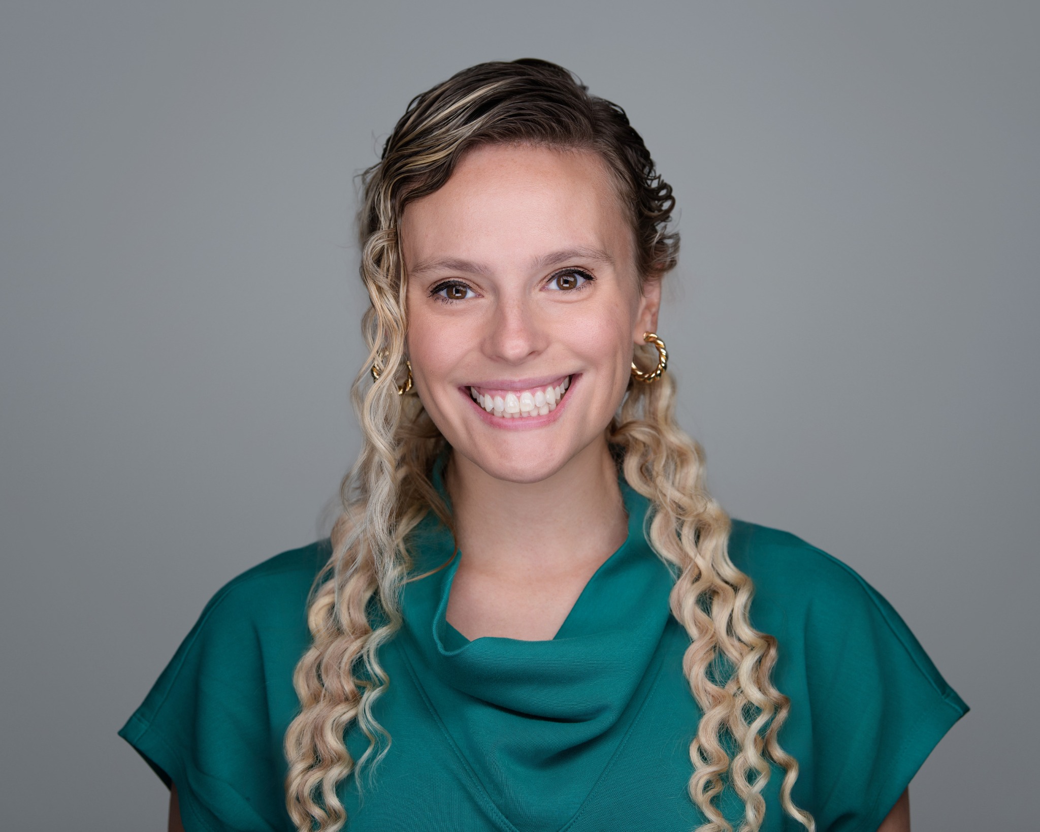 Lauren Livak Gilbert wearing a teal top