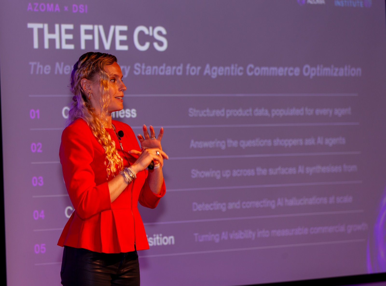 Lauren presenting agentic commerce ideas in a red blazer
